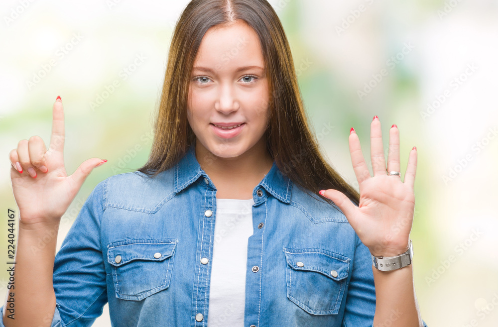Young caucasian beautiful woman over isolated background showing and pointing up with fingers number seven while smiling confident and happy. Young caucasian beautiful woman over isolated background showing and pointing up with fingers number seven while smiling confident and happy.