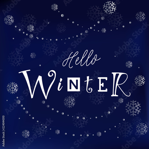 Modern calligraphy lettering of Hello winter in white on dark blue background decorated with silver snowflakes and pearls for decoration, greeting card, poster, banner, sticker, postcard