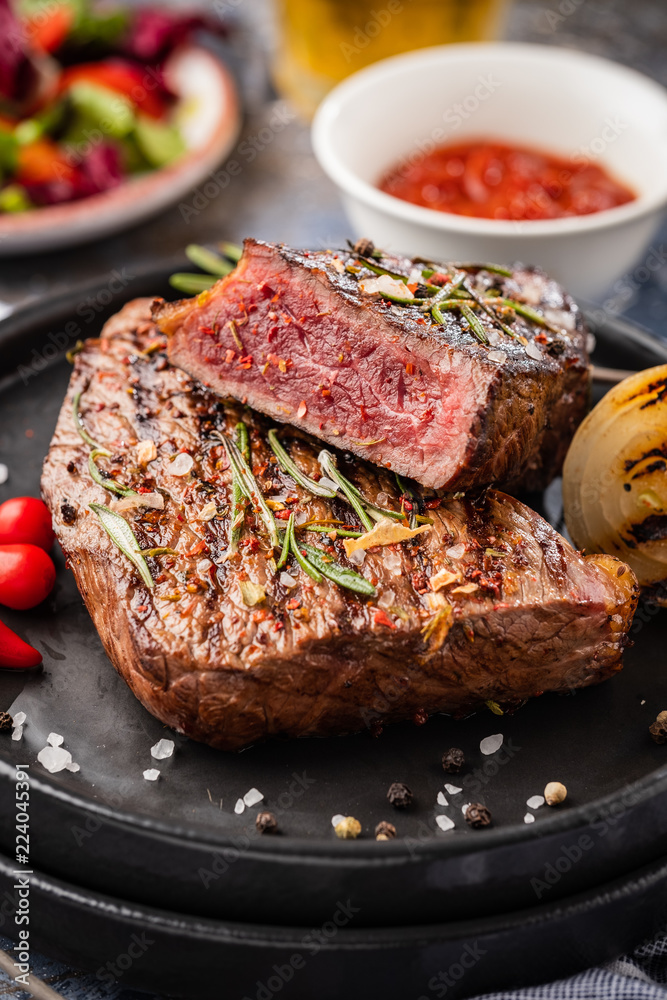 Steak beef. Beef steak medium with red pepper, aromatic herbs and fried onion Steak beef. Beef steak medium with red pepper, aromatic herbs and fried onion