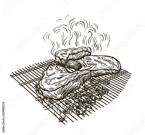 juicy steak fried on a grate on coals