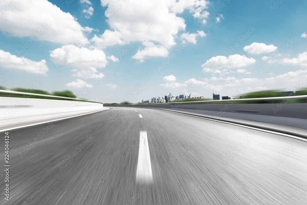 empty highway through modern city empty highway through modern city