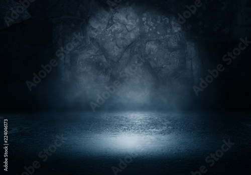 Background of an empty dark room. Empty walls  lights  smoke  glow  rays