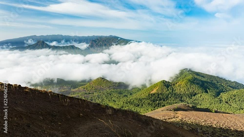 Timelapse sequence of tradewind clouds moving against the mountains of La Palma between the Caldera de Taburiente in the background and the Cumbre Vieja. Seen from the top of the volcano Birigoyo in t