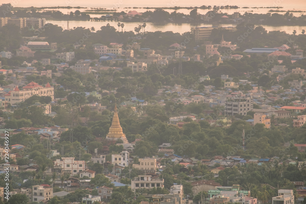 Mandalay city with Irrawaddy river and mountains background from top of Mandalay Hill at Sunset. landmark and popular for tourist attractions in Myanmar