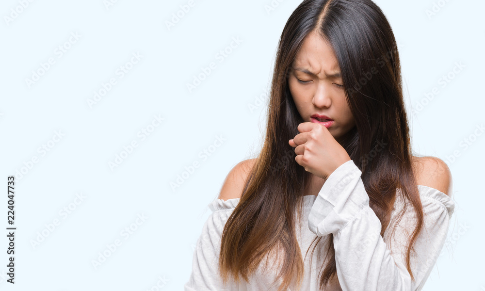Young asian woman over isolated background feeling unwell and coughing as symptom for cold or bronchitis. Healthcare concept. Young asian woman over isolated background feeling unwell and coughing as symptom for cold or bronchitis. Healthcare concept.