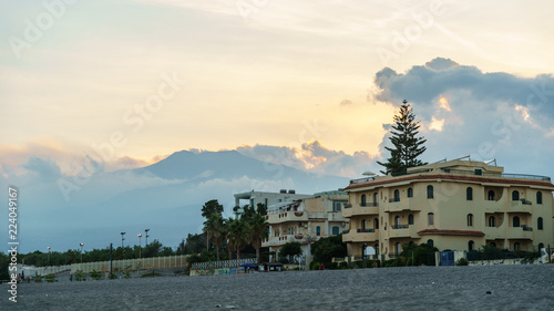 Etna volcano with clouds surrounding the mountain top