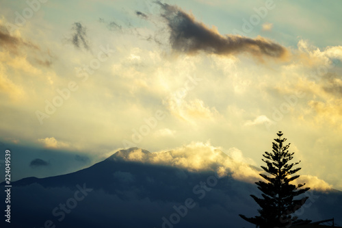 Etna volcano with clouds surrounding the mountain top
