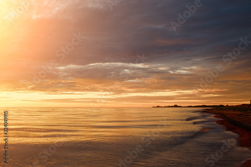 Majestic summer sunset over the Chudskoy lake