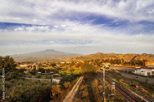 Etna volcano with clouds surrounding the mountain top