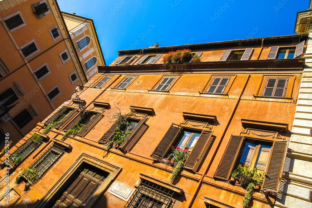 Obraz premium View on the historic architecture in Rome, Italy on a sunny day.