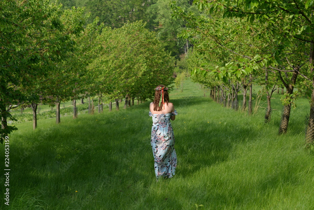 Slavic woman in a fruit garden Slavic woman in a fruit garden