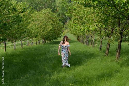 Slavic woman in a fruit garden
