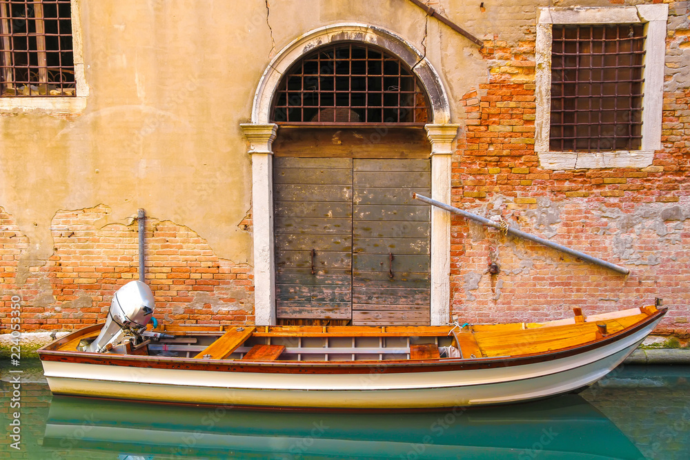 Closeup view of a boat in Venice, Italy on a sunny day.