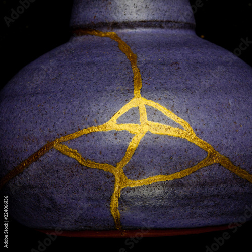 This is a small purple jar that I repaired with the Japanese art form of kintsugi with urushi lacquer and gold powder.