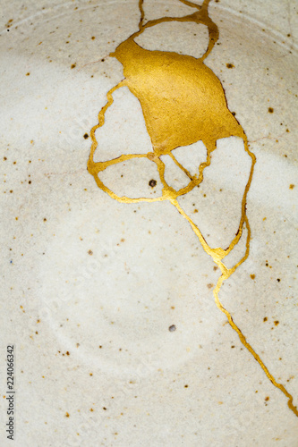 This is a bowl that I repaired using the Japanese art form of kintsugi with gold powder and urushi lacquer.
