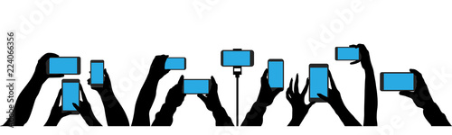 Crowd of people shoot the event on a smartphone. In the hands of the camera shoots a video at a party concert. Isolated silhouette set vector