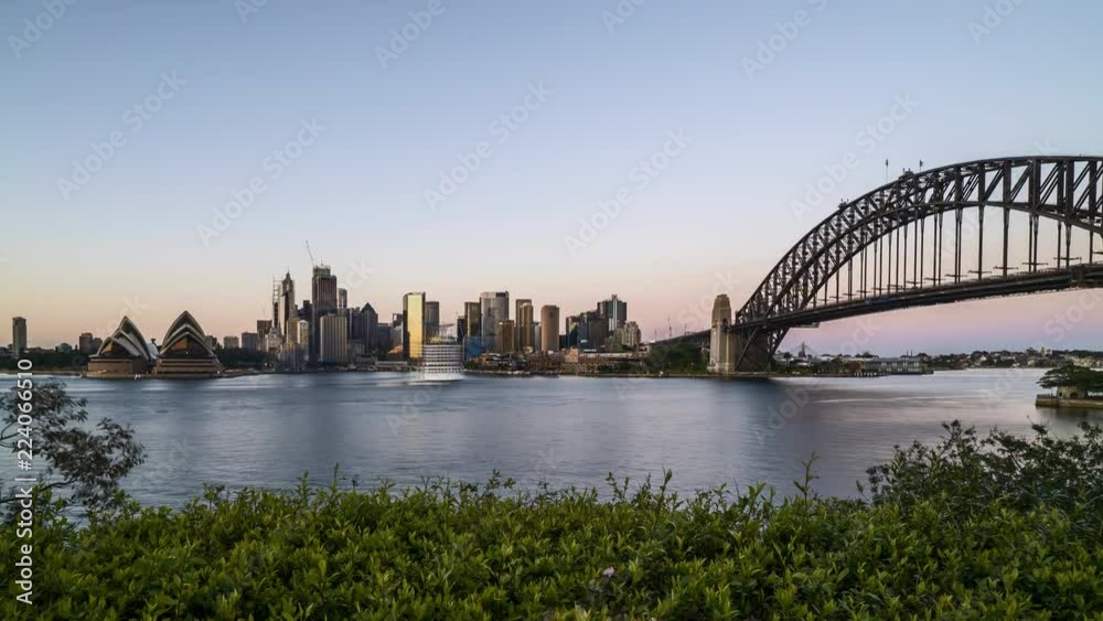 4k time lapse of sunrise night to day scene  at Sydney city skyline. Tilt up