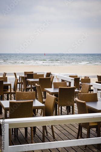 Outdoor cafe on beach © Voyagerix