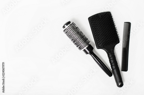 Professional hair dresser tools on white background with copy space