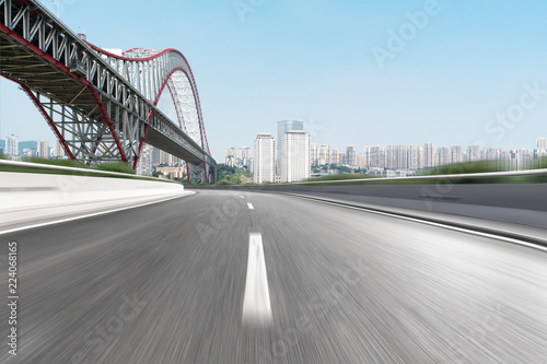 Fototapeta Naklejka Na Ścianę i Meble -  empty highway through modern city