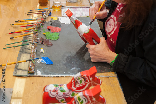 A Dalecarlian horse or Dala horse. Is a traditional carved, painted wooden horse. Mostly used as a toy for children or tourist souvenir. The red horse is  the most classic of the Swedish Dala Horse.