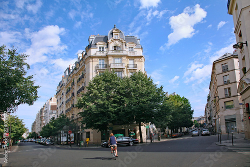 Paris residential street with elegant apartment buildings near Marais district photo