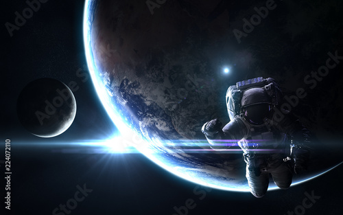 Fototapeta Naklejka Na Ścianę i Meble -  Astronaut, planet Earth and moon in bright blue rays of Sun. Abstract science fiction. Elements of the image are furnished by NASA