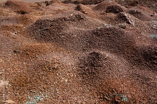 Red earth or soil background. Tropical laterite soil  background of red clay. Dry Orange surface, Picture of natural disaster. Drought land Caused by global warming and deforestation.