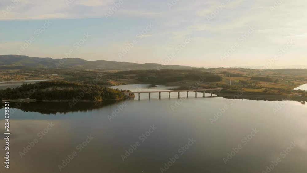 Aerial view of sunset on lake with reflection of clouds on the lake - Gruza lake, Kragujevac, Serbia Aerial view of sunset on lake with reflection of clouds on the lake - Gruza lake, Kragujevac, Serbia