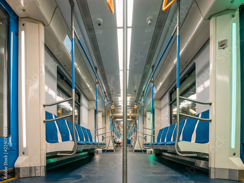 New modern subway metro train inside interior, empty public transport