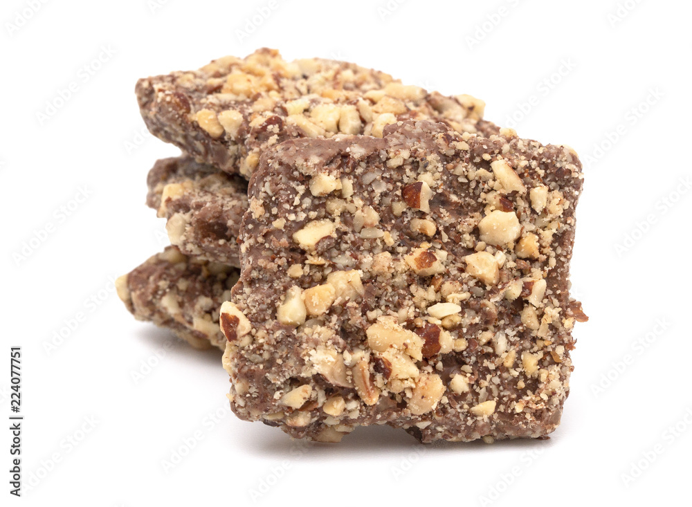 Chocolate Covered English Toffee Coated in Nuts on a White Background Chocolate Covered English Toffee Coated in Nuts on a White Background