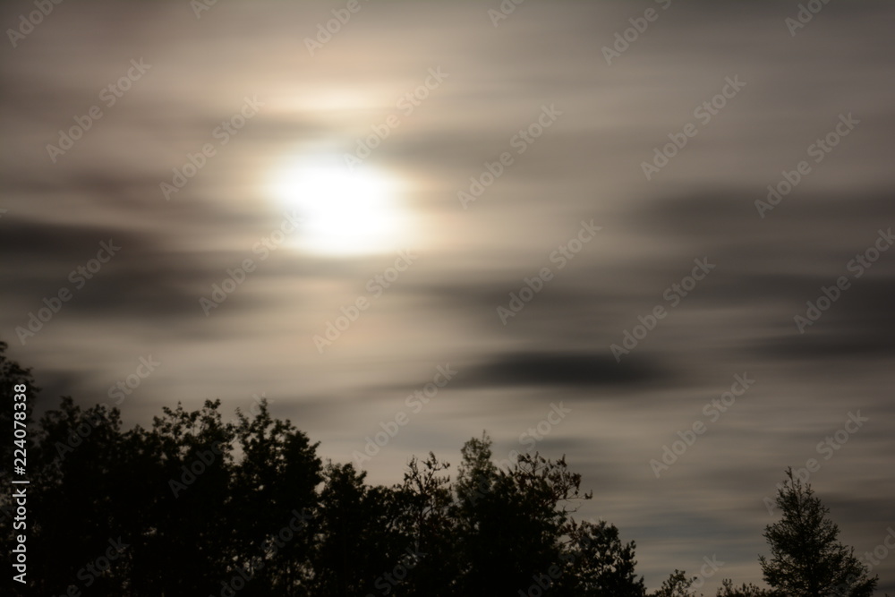 moon light shining through clouds moon light shining through clouds