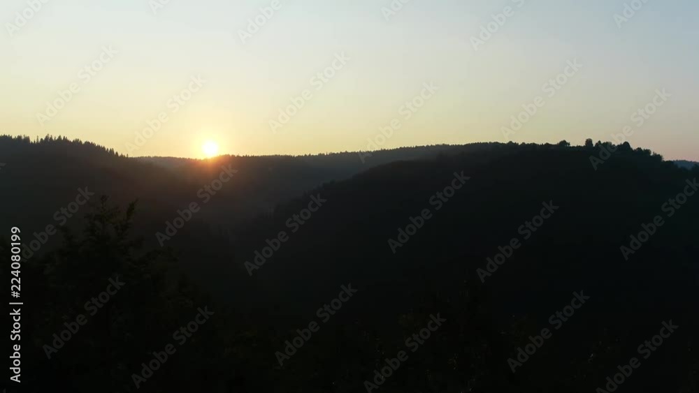 aerial view on a wild mountains pinetree forest on beautiful sunrise aerial view on a wild mountains pinetree forest on beautiful sunrise