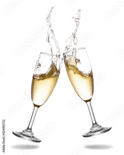 Carta da parati Cheers champagne with splashing out of glass isolated on white background