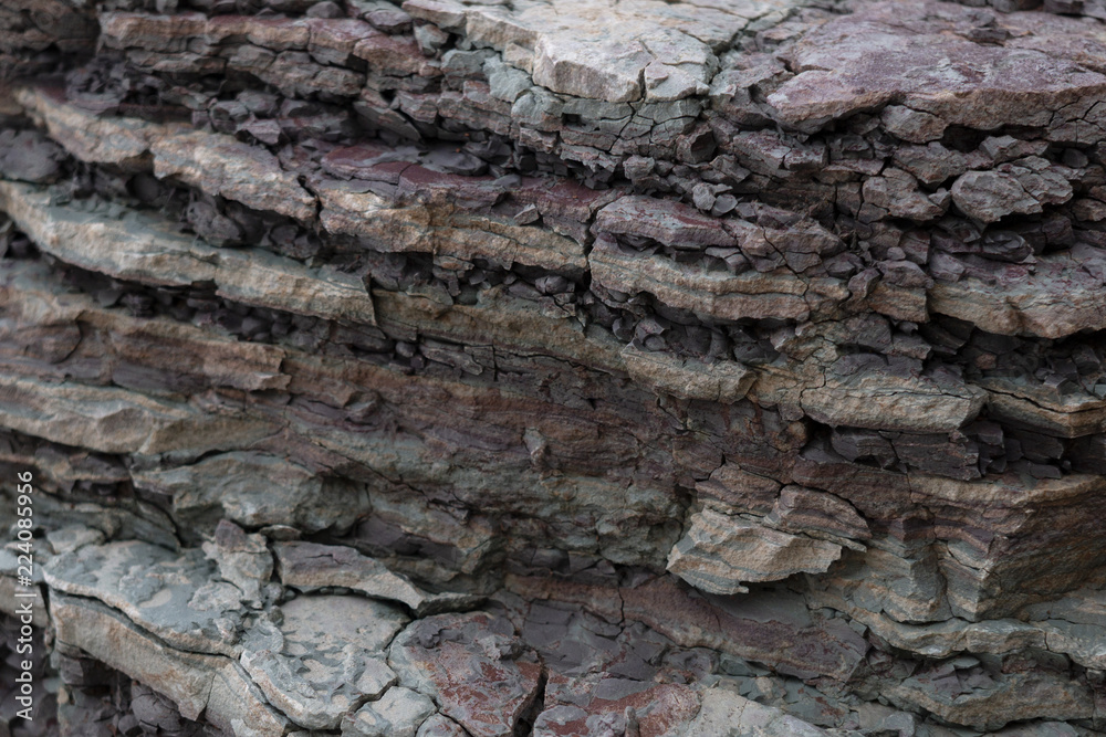 Soil cut-sandstone, stones, clay, sand structure and layers. slice of sand with layers of different structures. Soil cut-sandstone, stones, clay, sand structure and layers. slice of sand with layers of different structures.
