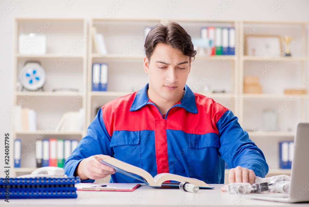 Worker in uniform working on project Worker in uniform working on project