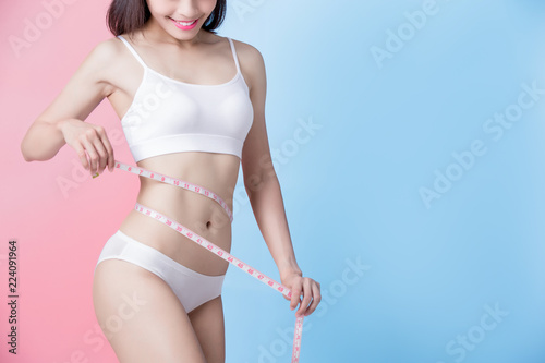 woman show her thin waist