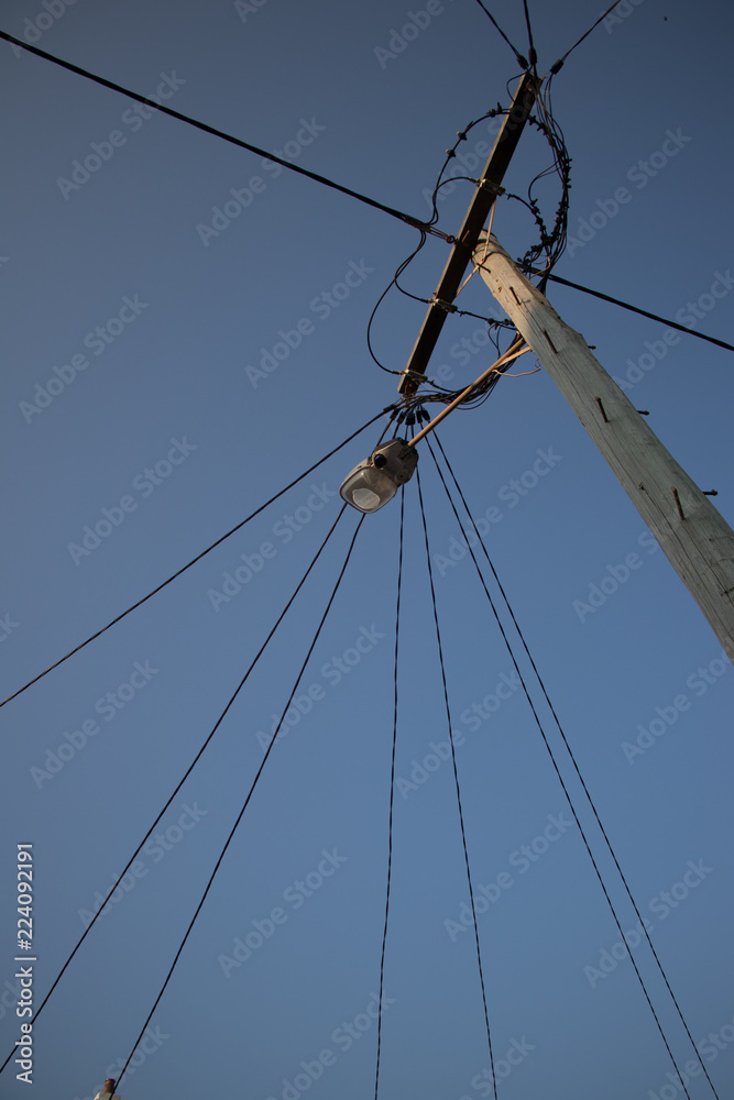 Fototapeta premium Power Pole and Street Lamp