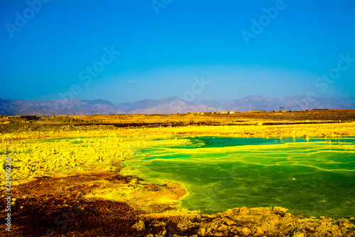 landscape with yellow field and blue sky, Danakil, Ethiopia photo