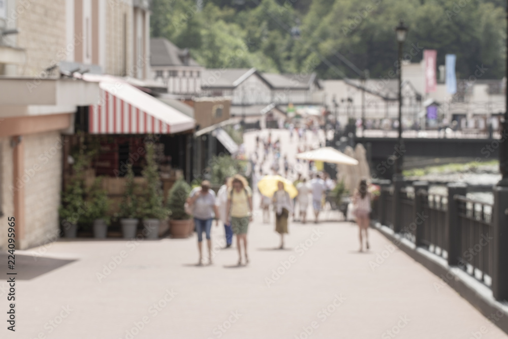 Defocused background of the main street in a town
