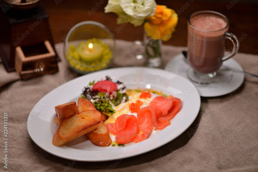 slicing salmon with croutons