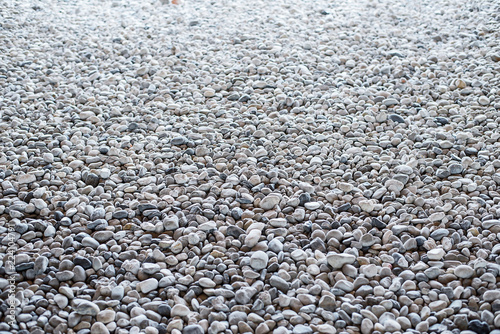 Perspective style, natural pebbles in dense shades of gray. photo