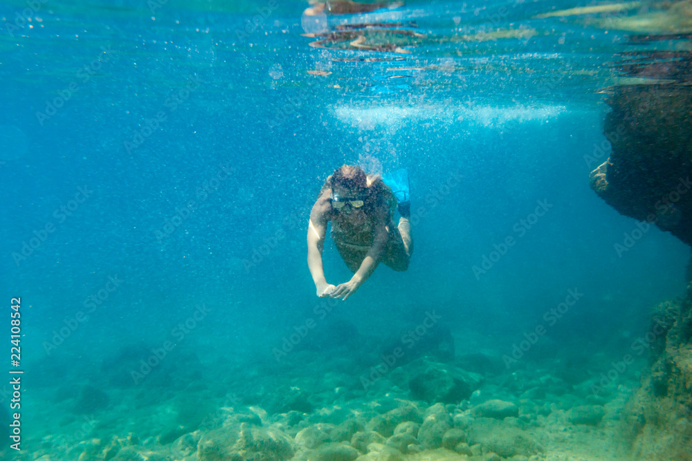 Snorkeling underwater in the tropical sea