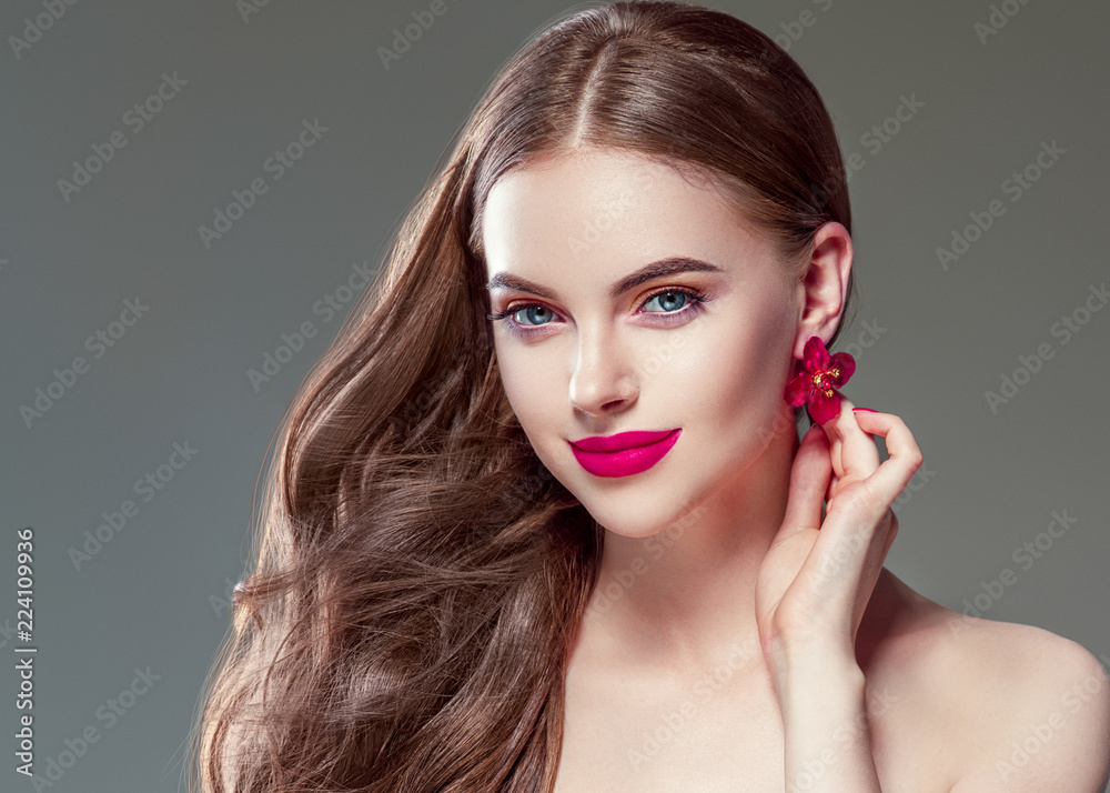 Fototapeta premium Beautiful woman with manicured nails beautiful hands and hairstyle