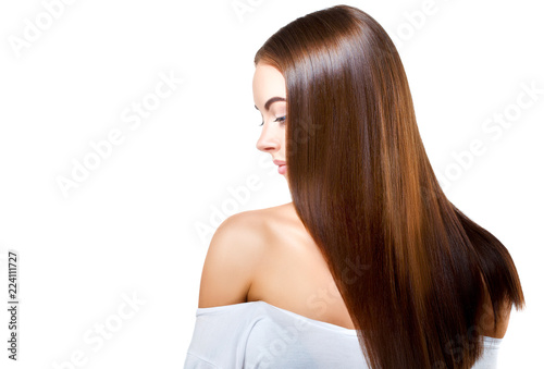 Woman with beautiful long hair isolated on white healthy and shine hairstyle