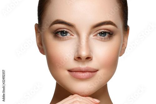 Obraz na plátně Beautiful face woman closeup isolated on white healthy skin