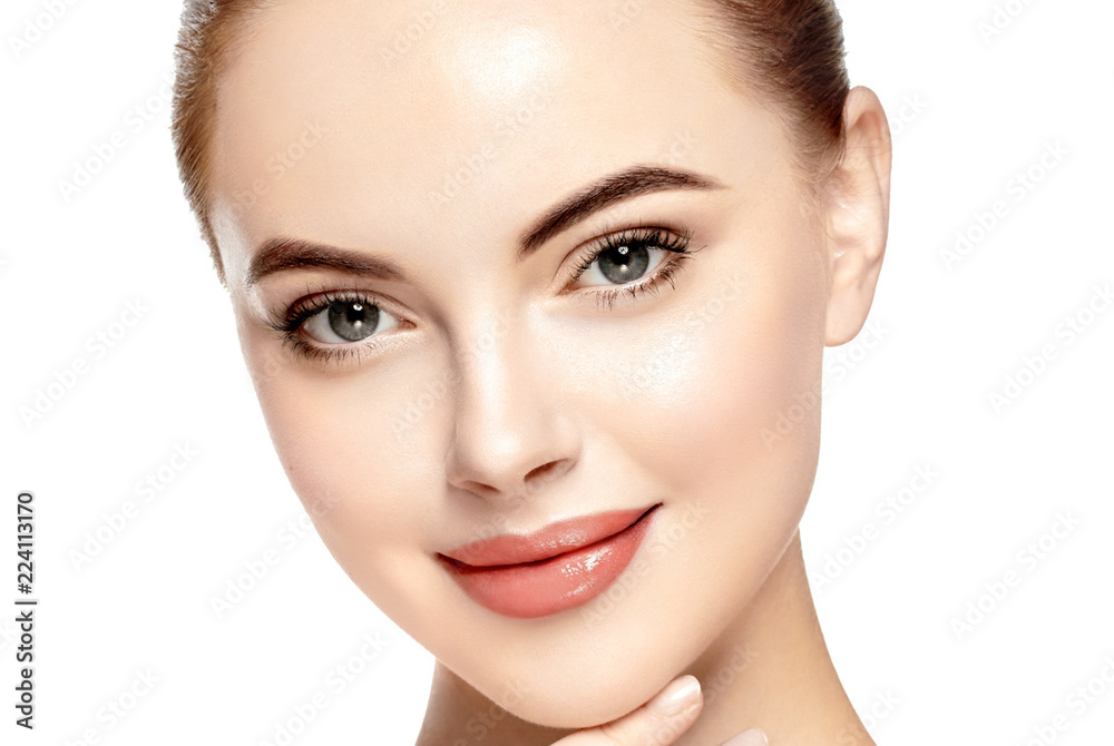 Beautiful face woman close up with healthy skin isolated on white Beautiful face woman close up with healthy skin isolated on white