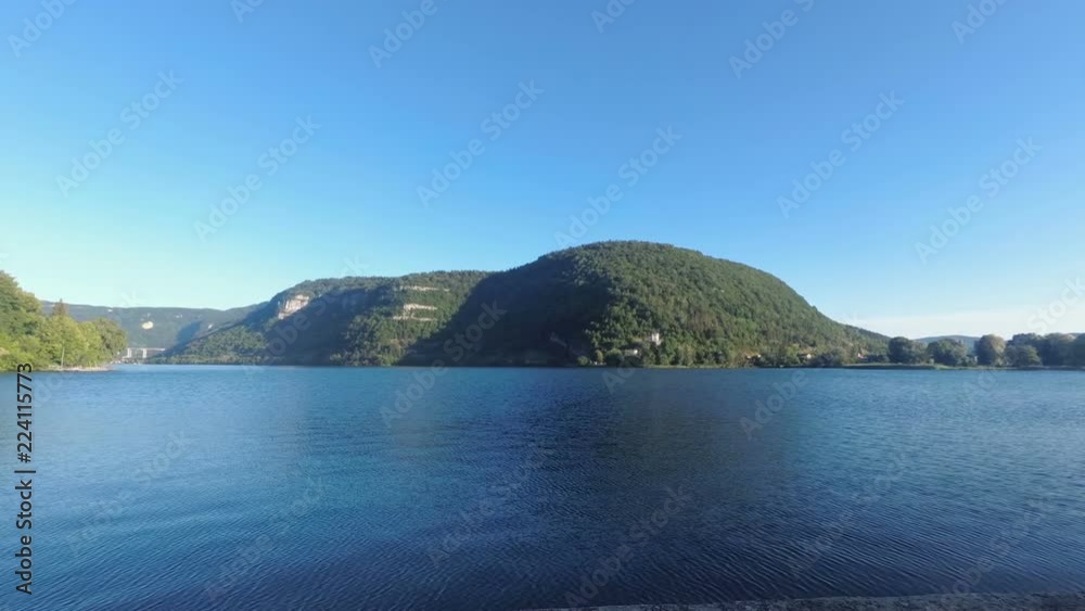 Park on the shore of the French lake Nantua. The camcorder turns slowly from left to right. Park on the shore of the French lake Nantua. The camcorder turns slowly from left to right.
