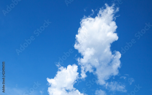 Fototapeta Naklejka Na Ścianę i Meble -  White cumulus clouds formation in clear blue sky