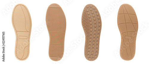Four shoe sole in row. White background.